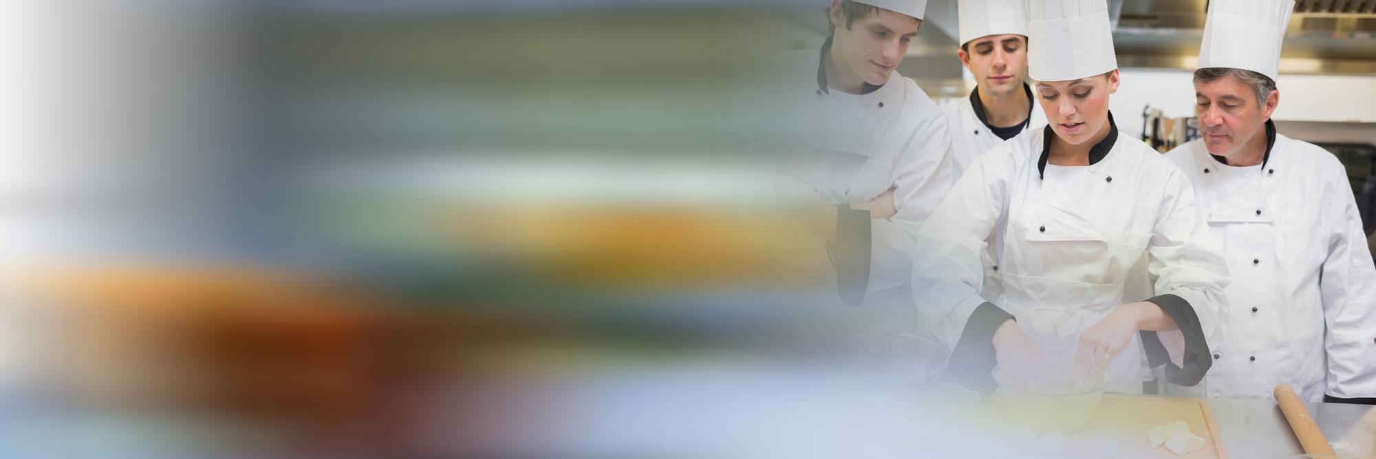 Wide shot of culinary studio with students